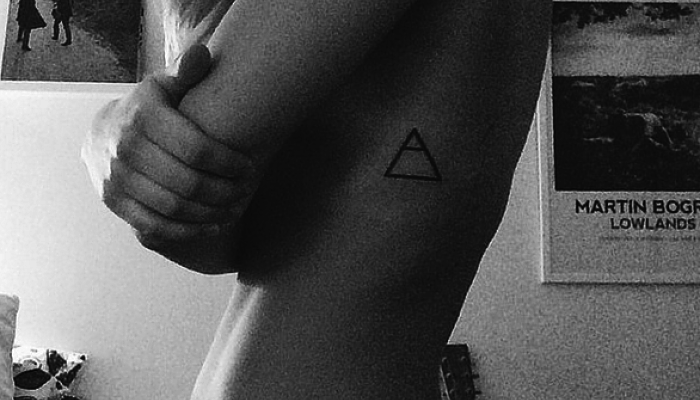 triangulos tatuajes de mujer